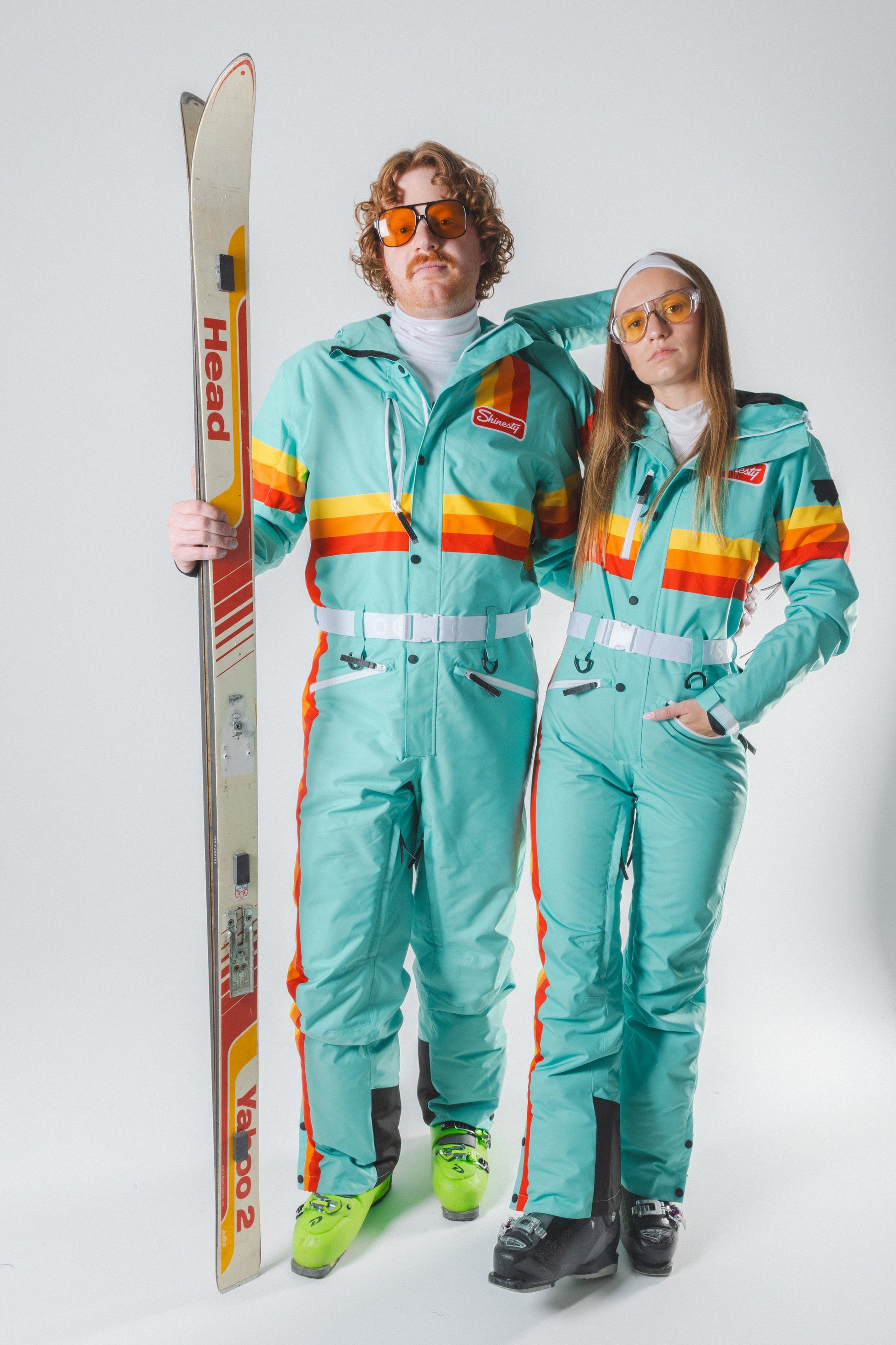 The Midday Aprs | Teal and Orange Retro Stripe One Piece Ski Suit - M The Midday Aprs | Teal and Orange Retro Stripe One Piece Ski Suit - M