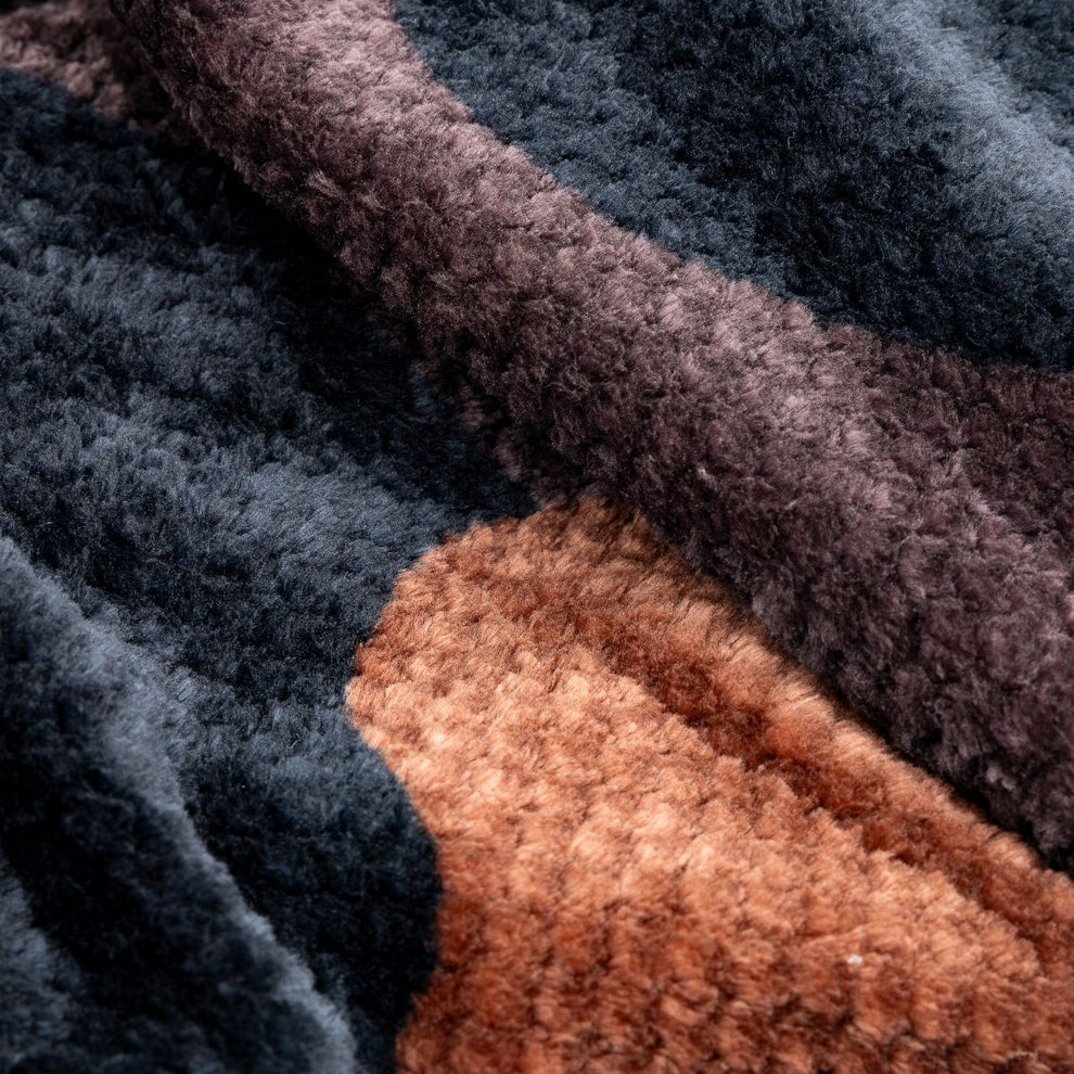 Rumpl - Fleece Puffy Blanket - Puzzled Black