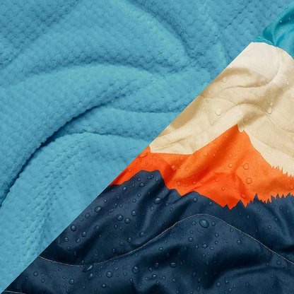 Rumpl - Fleece Puffy Blanket - Teton Glow