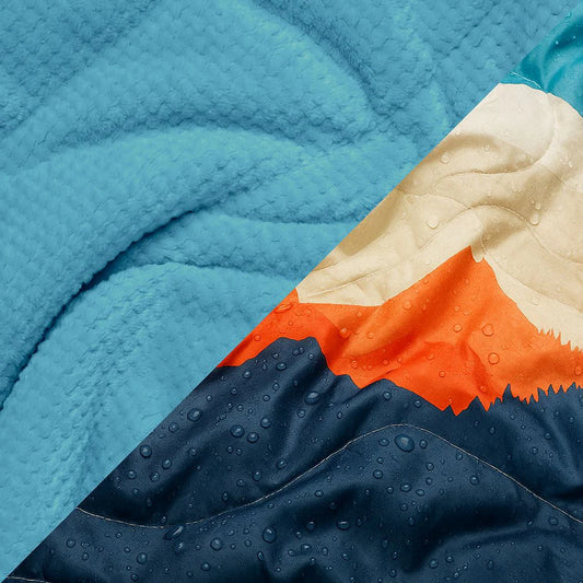 Rumpl - Fleece Puffy Blanket - Teton Glow