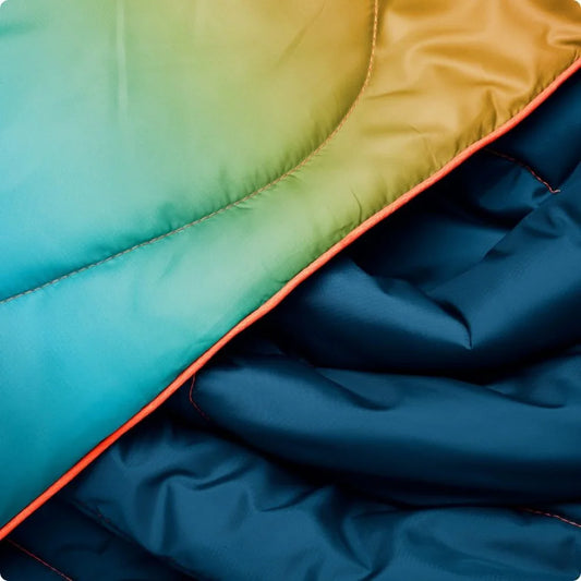 Rumpl - Original Puffy Blanket - Baja Fade